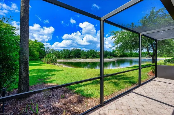 a view of a back yard from a balcony