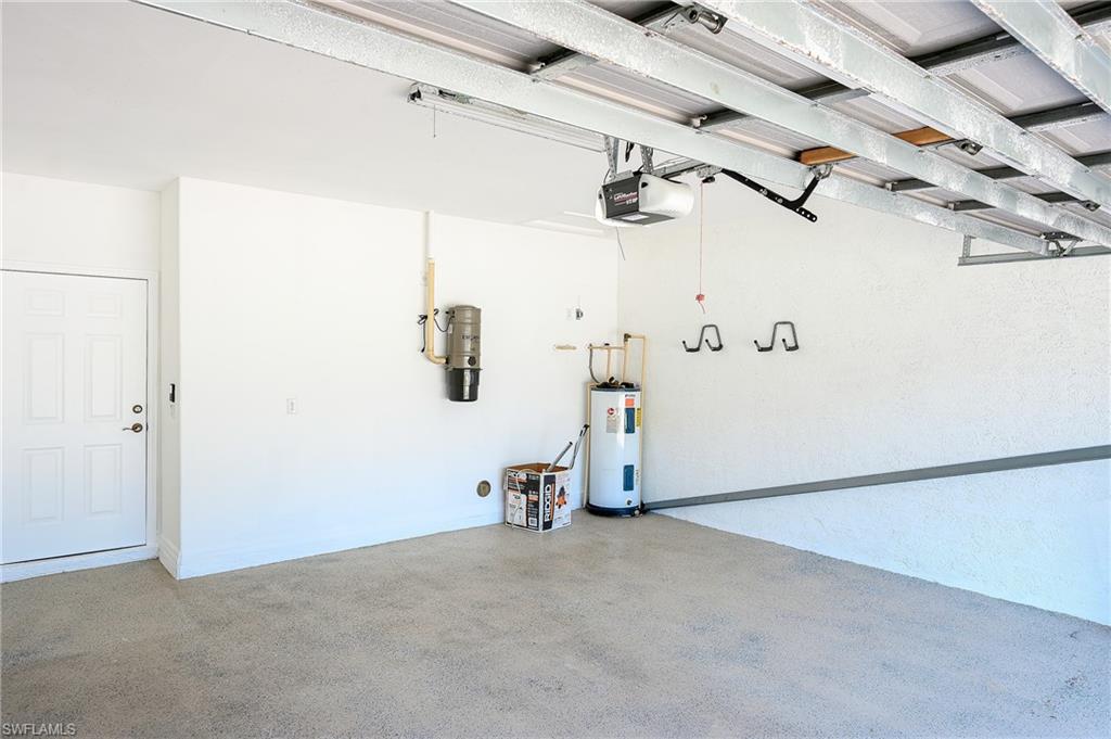 15056 Summit Pl Circle, Unit 228 Naples, FL 34119 - Photo 27 of 27 a view of a room with gym equipment