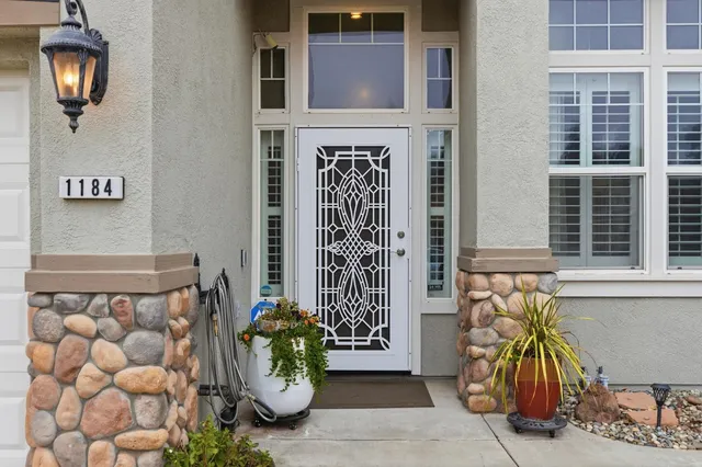 a view of a entryway door front of house