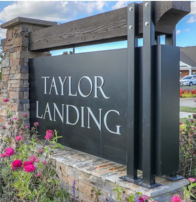 229 River Road Columbia, TN 38401 - Photo 4 of 10 a street sign that is on the side of a building