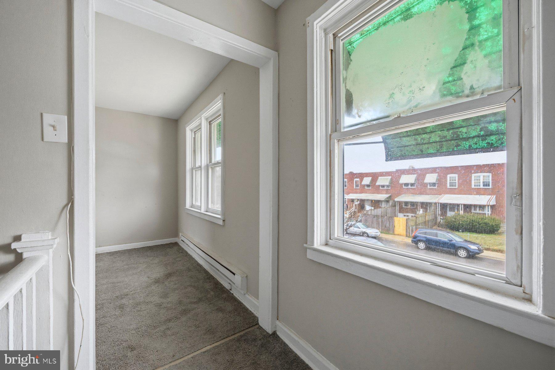 923 1st Street Baltimore, MD 21225 - Photo 18 of 32 a view of hallway with windows