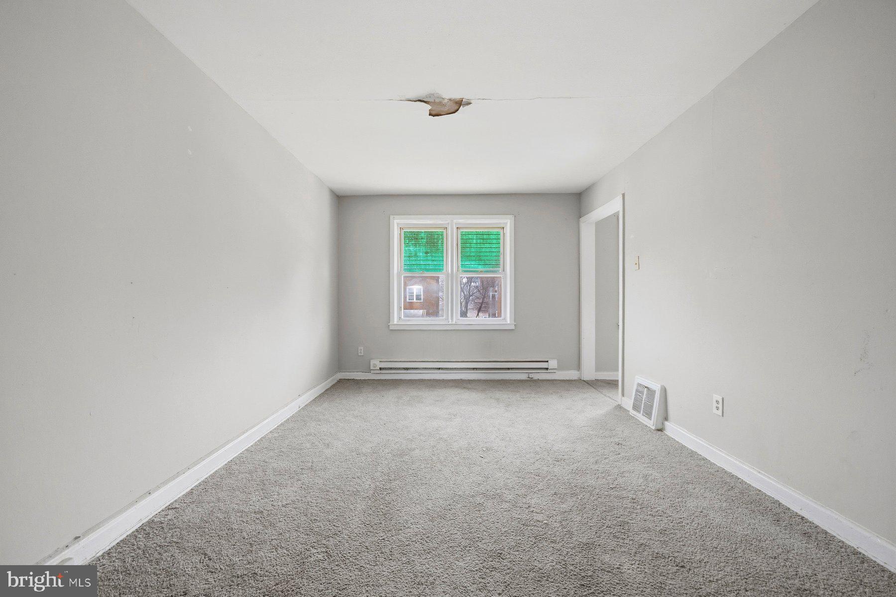 923 1st Street Baltimore, MD 21225 - Photo 19 of 32 an empty room with windows