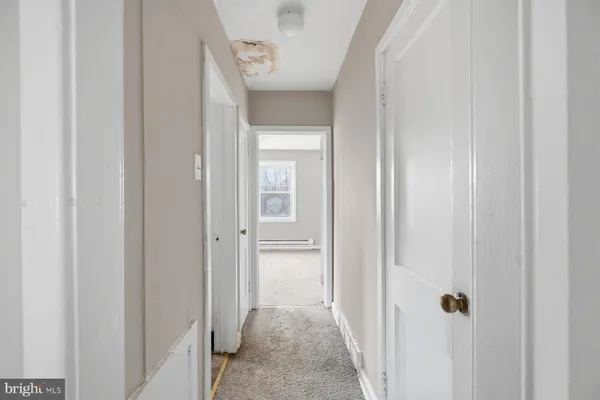 a kitchen that has a sink and a stove