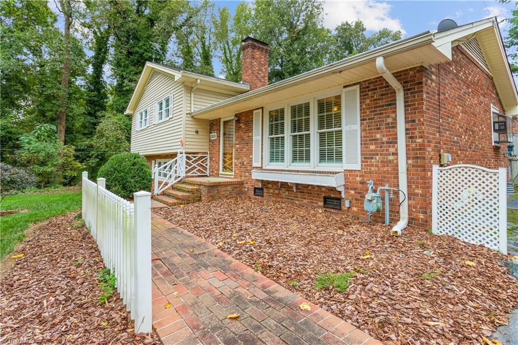 5306 Mockingbird Road Greensboro, NC 27406 - Photo 3 of 26 This home offers replacement windows, plantation shutters, multiple storage buildings, brick and vinyl exterior.