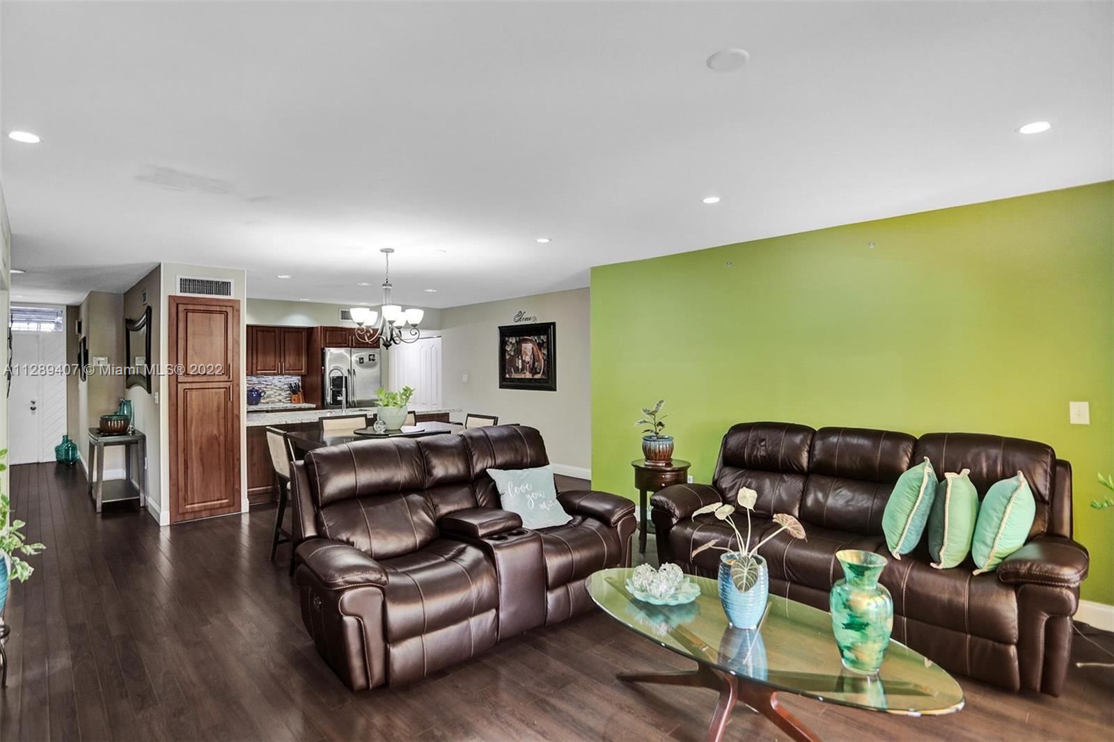 16511 Bridge End Road Miami Lakes, FL 33014 - Photo 11 of 43 a living room with furniture