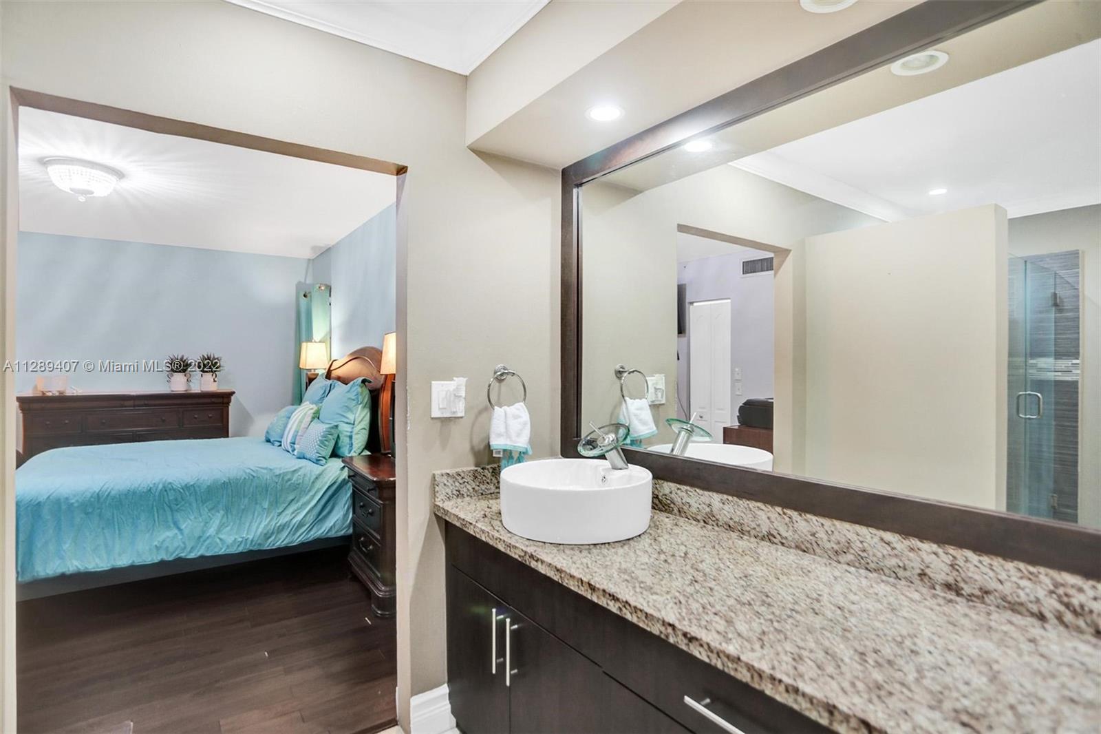 16511 Bridge End Road Miami Lakes, FL 33014 - Photo 26 of 43 a bedroom with a bed and window