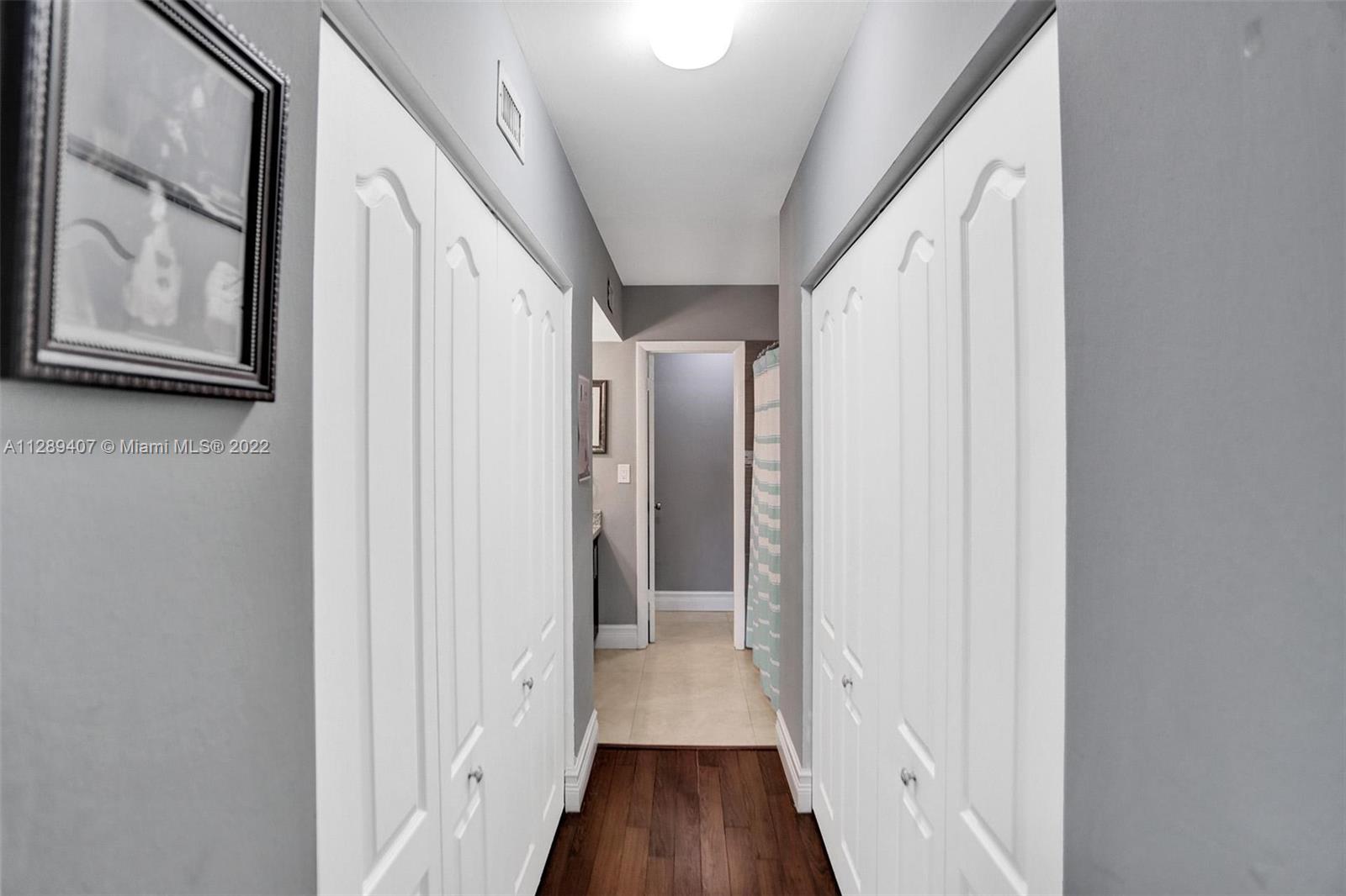 16511 Bridge End Road Miami Lakes, FL 33014 - Photo 33 of 43 a view of hallway with wooden floor