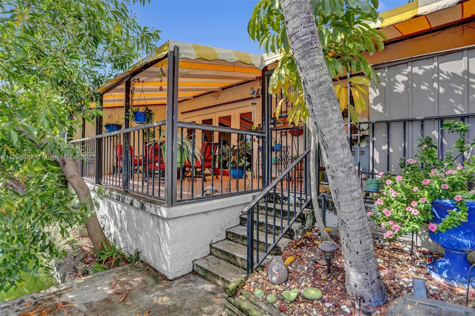 16511 Bridge End Road Miami Lakes, FL 33014 - Photo 42 of 43 a view of entryway with an outdoor