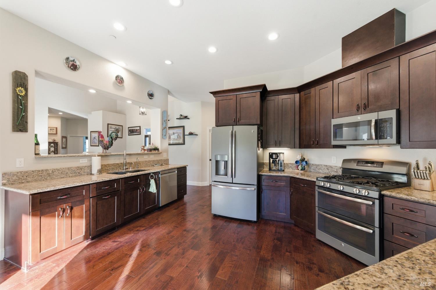 7561 Pleasants Valley Road Vacaville, CA 95688 - Photo 10 of 44 Lovely kitchen with granite counters and upgraded appliences.