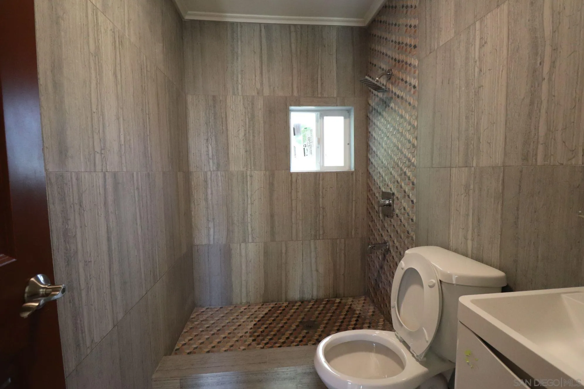 2030 Valley Rim Road El Cajon, CA 92019 - Photo 54 of 75 a bathroom with a toilet and a sink