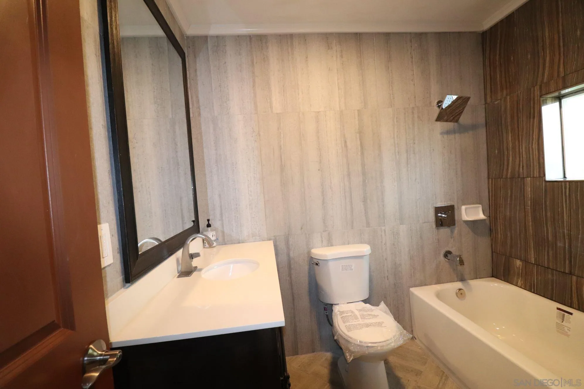 2030 Valley Rim Road El Cajon, CA 92019 - Photo 61 of 75 a bathroom with a sink a toilet and a bathtub