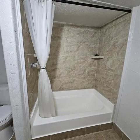 a bathroom with a bathtub