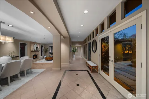 a kitchen with stainless steel appliances granite countertop a sink and a counter top space