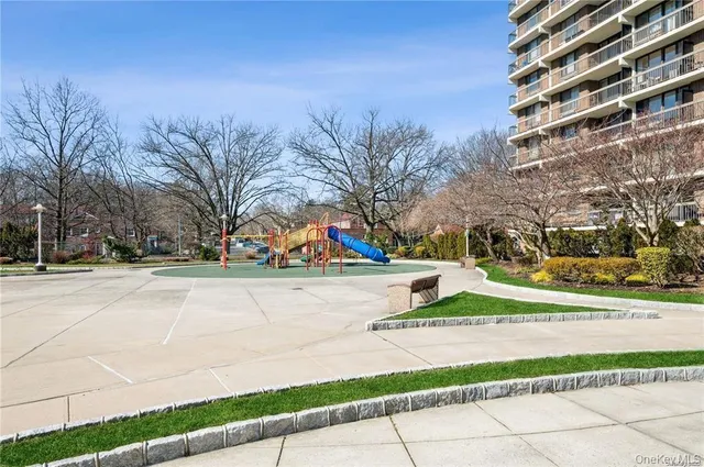 a view of street with tall buildings
