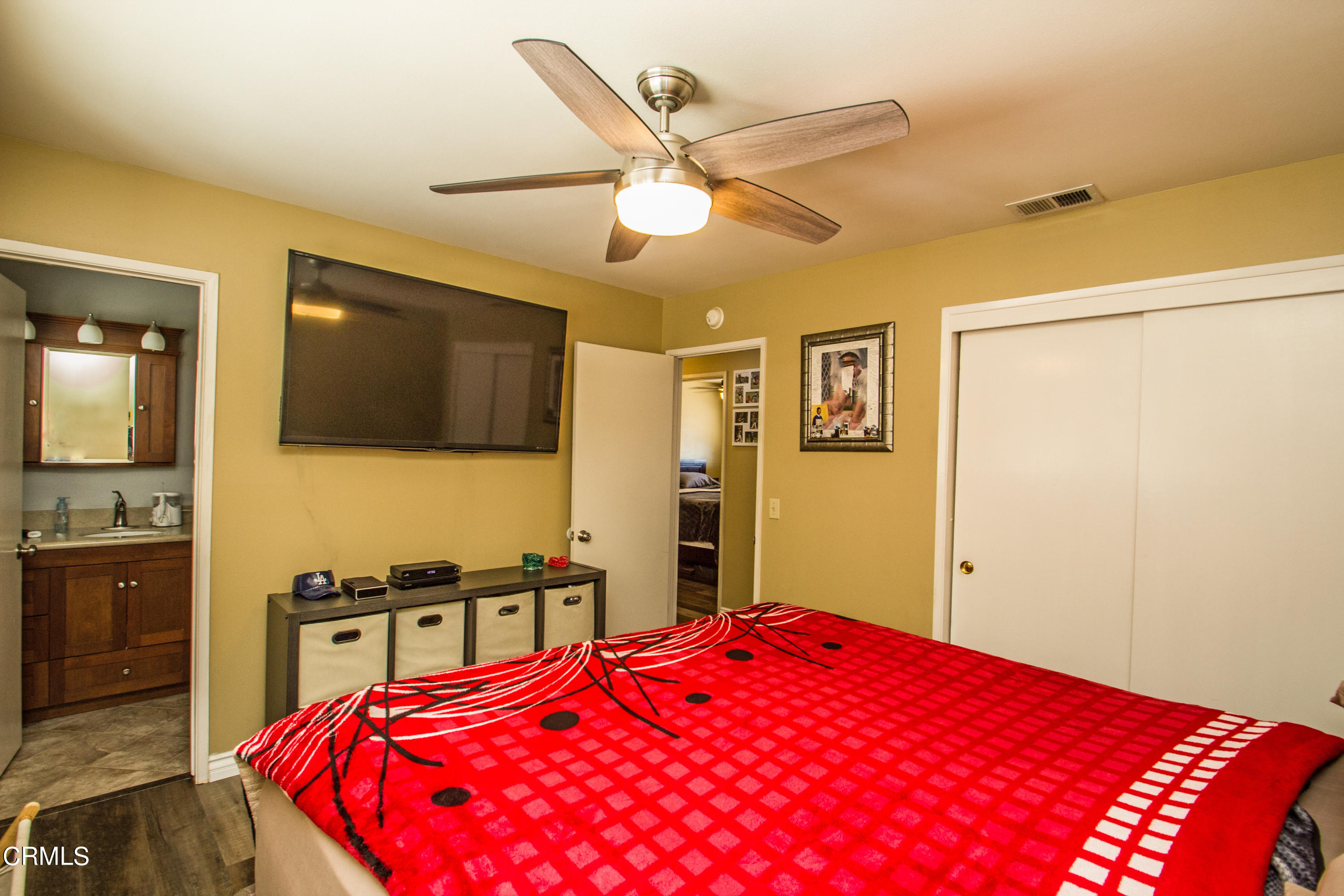 4221 Olds Road Oxnard, CA 93033 - Photo 11 of 34 a bedroom with a bed and a flat screen tv