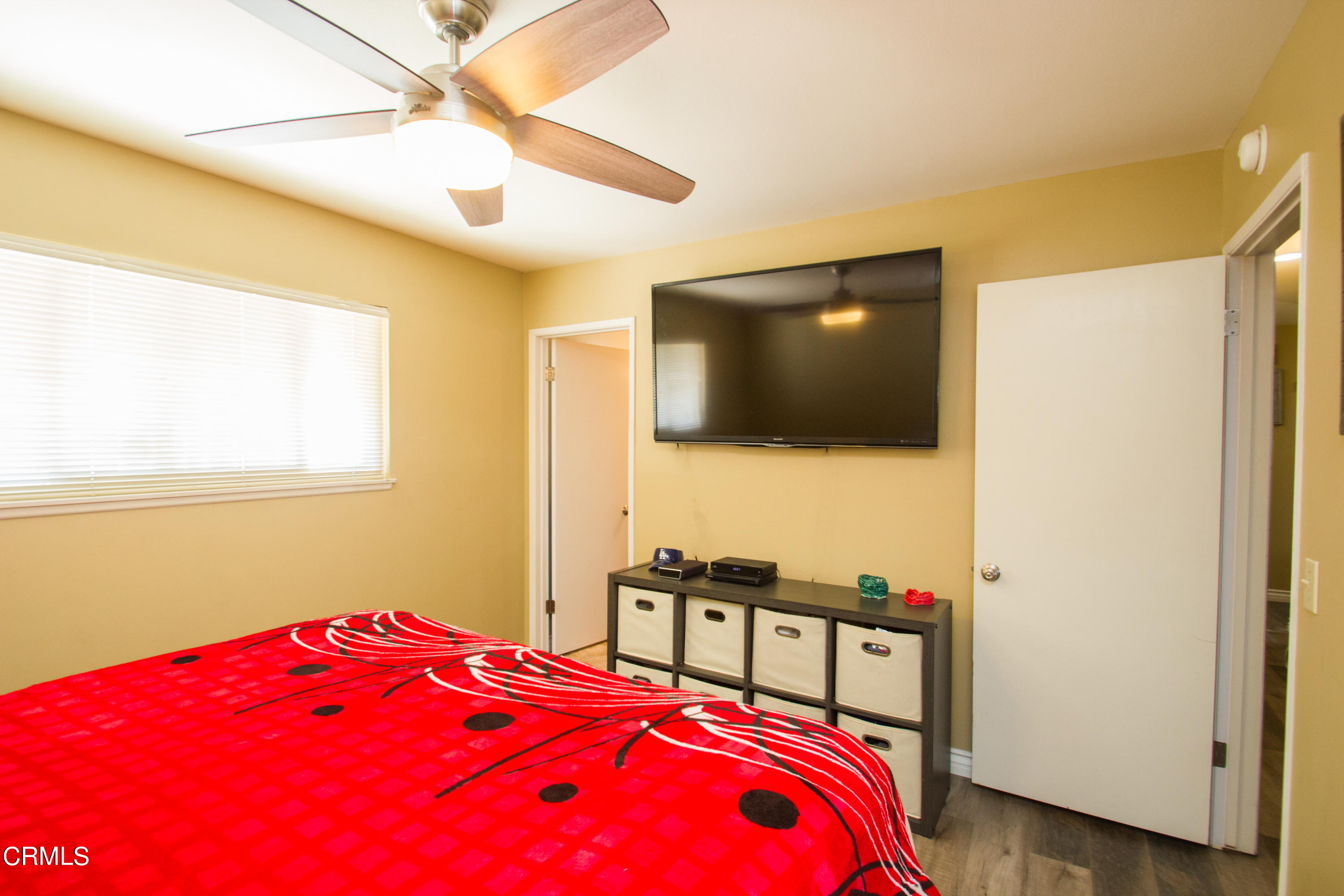 4221 Olds Road Oxnard, CA 93033 - Photo 12 of 34 a bedroom with a bed and a flat screen tv