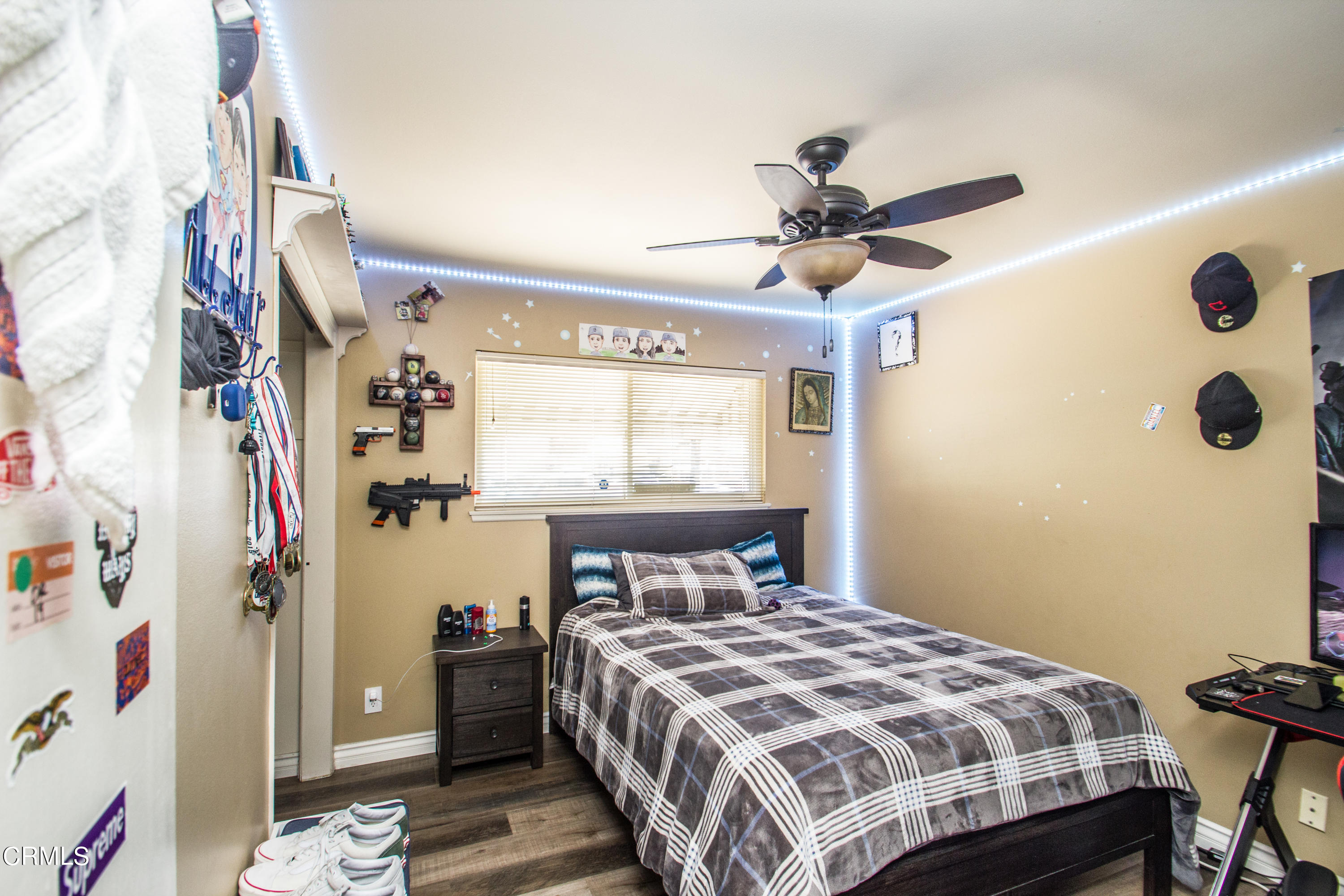 4221 Olds Road Oxnard, CA 93033 - Photo 17 of 34 a bedroom with a bed and a window