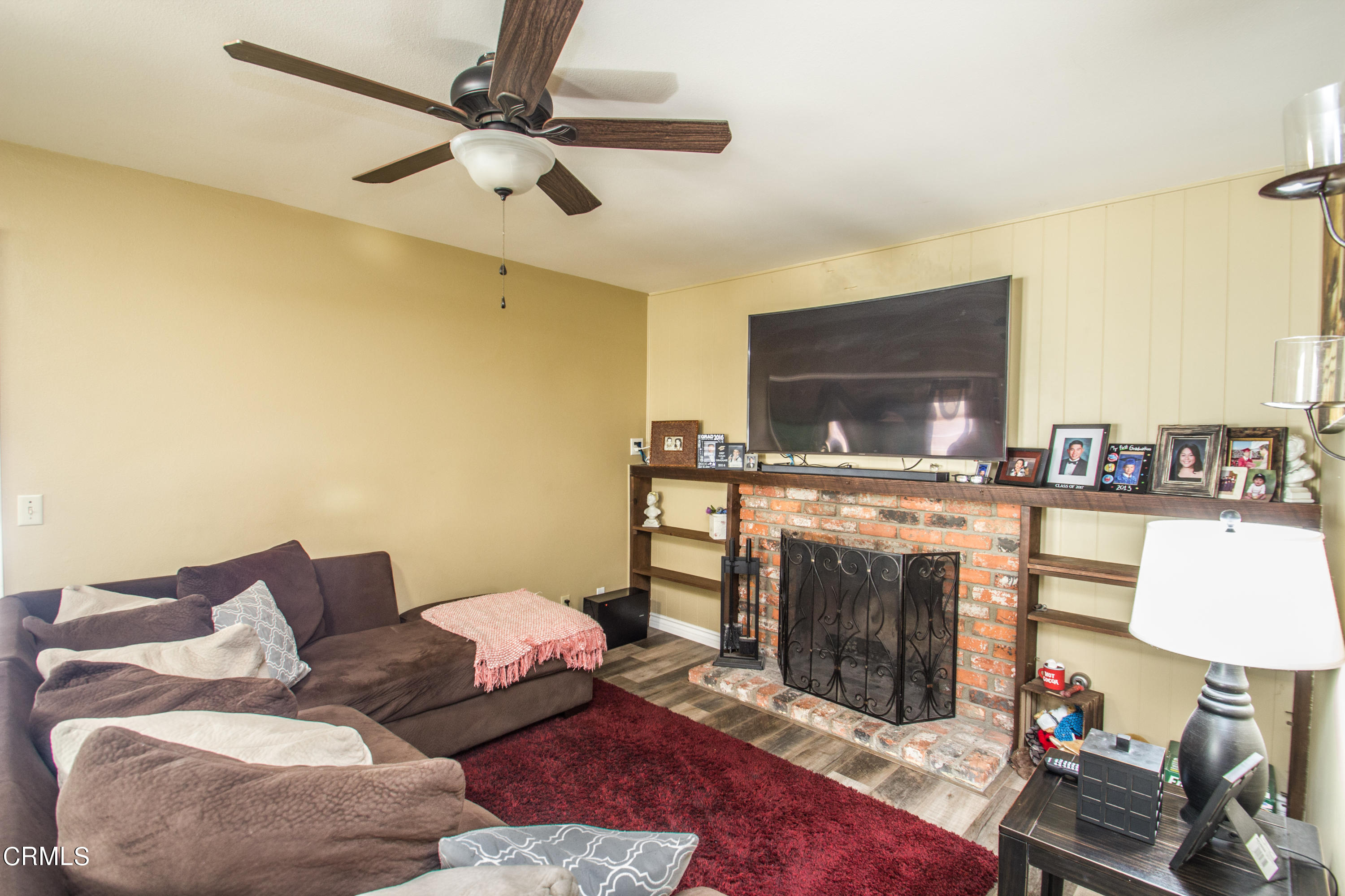 4221 Olds Road Oxnard, CA 93033 - Photo 24 of 34 a living room with furniture and a fireplace