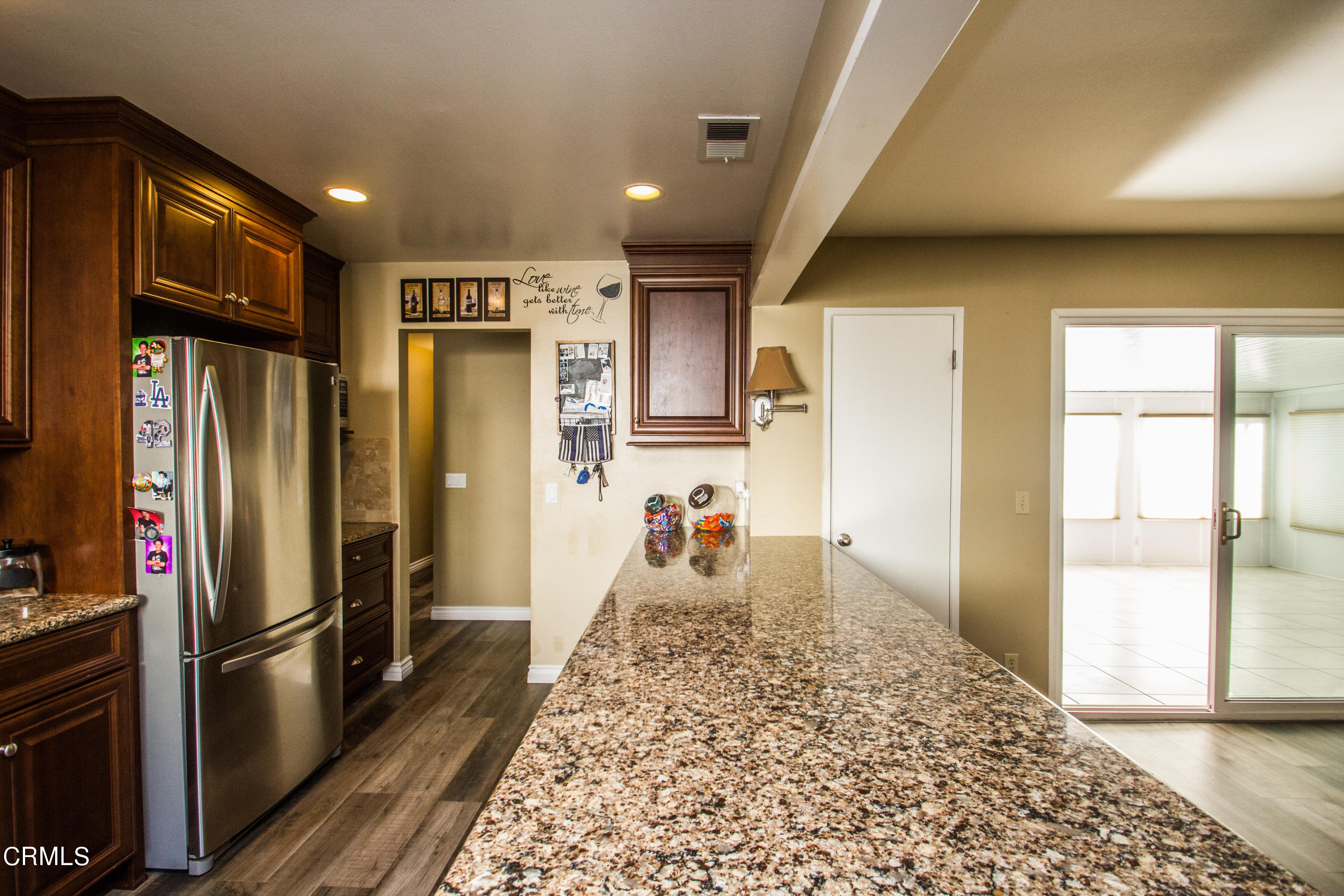 4221 Olds Road Oxnard, CA 93033 - Photo 4 of 34 a kitchen with stainless steel appliances granite countertop a refrigerator and a sink