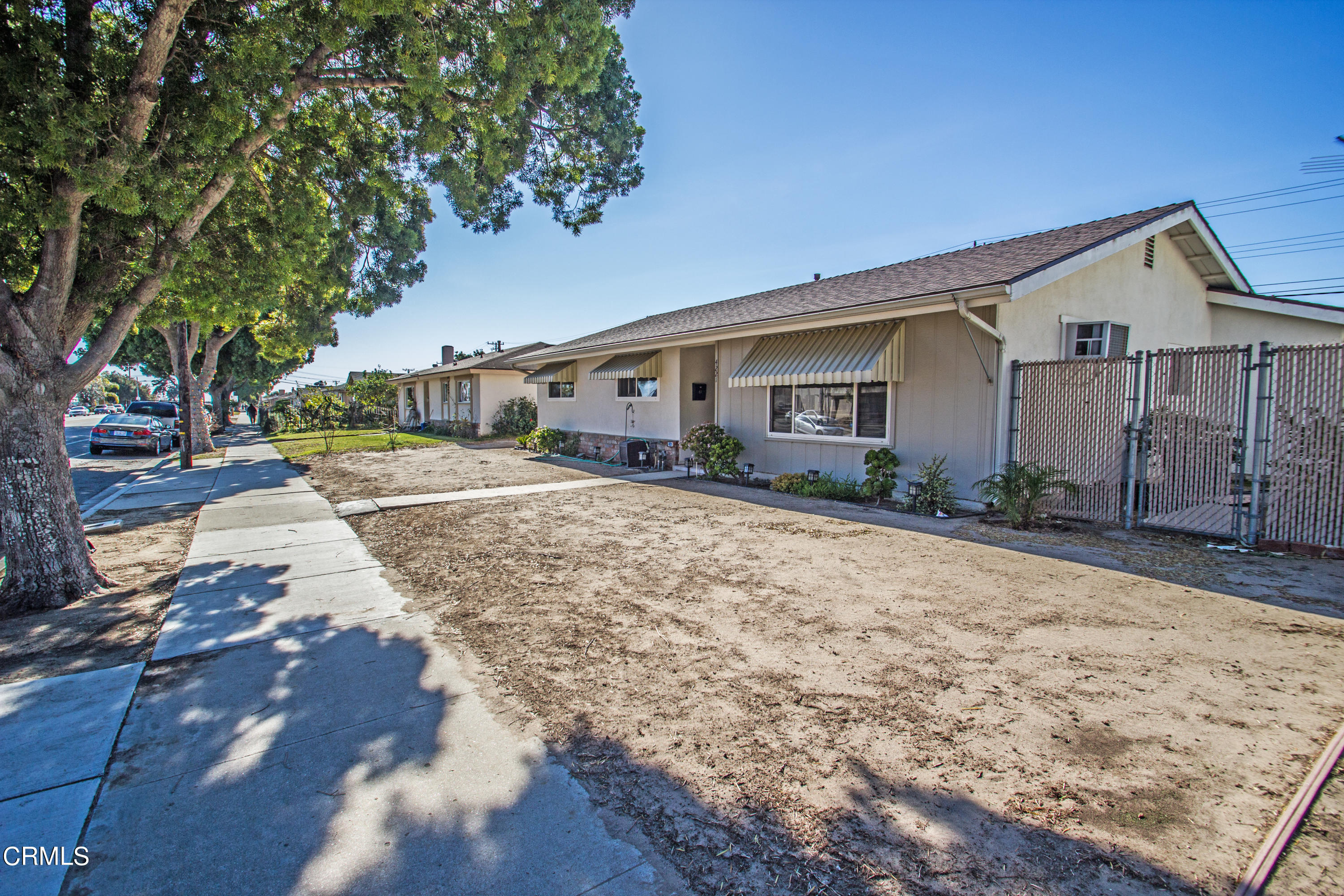 4221 Olds Road Oxnard, CA 93033 - Photo 34 of 34 a view of a house with a yard