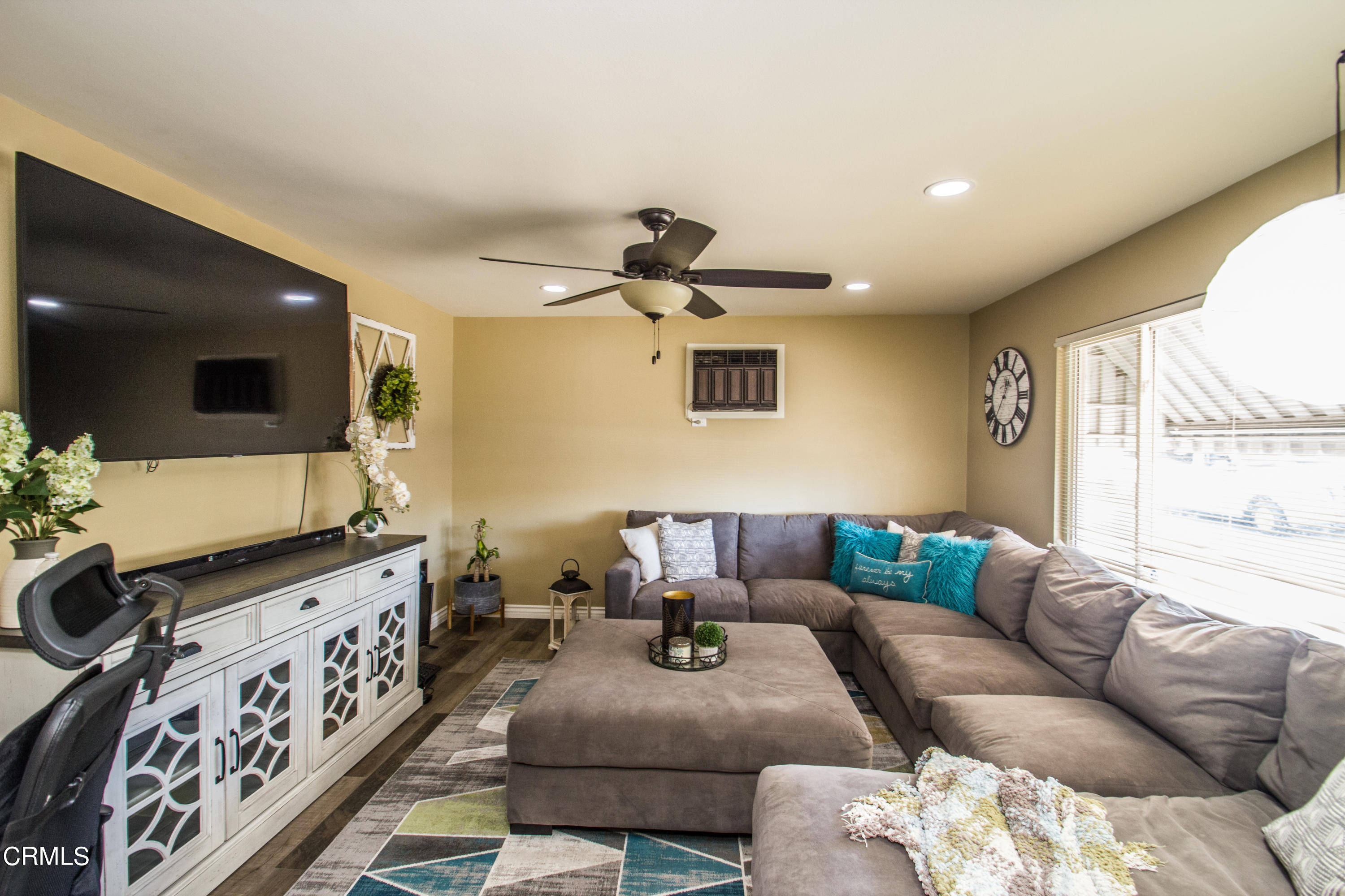 4221 Olds Road Oxnard, CA 93033 - Photo 6 of 34 a living room with furniture and a flat screen tv
