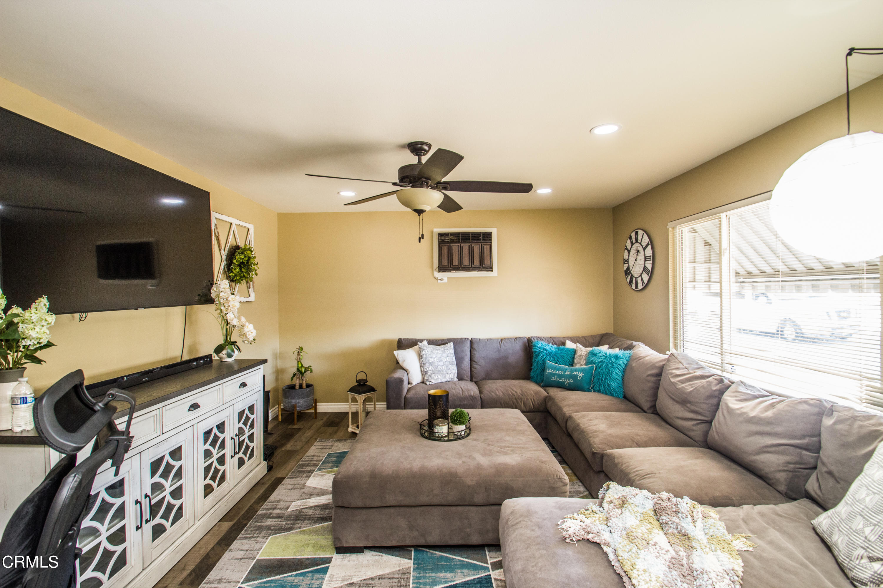 4221 Olds Road Oxnard, CA 93033 - Photo 8 of 34 a living room with furniture and a flat screen tv
