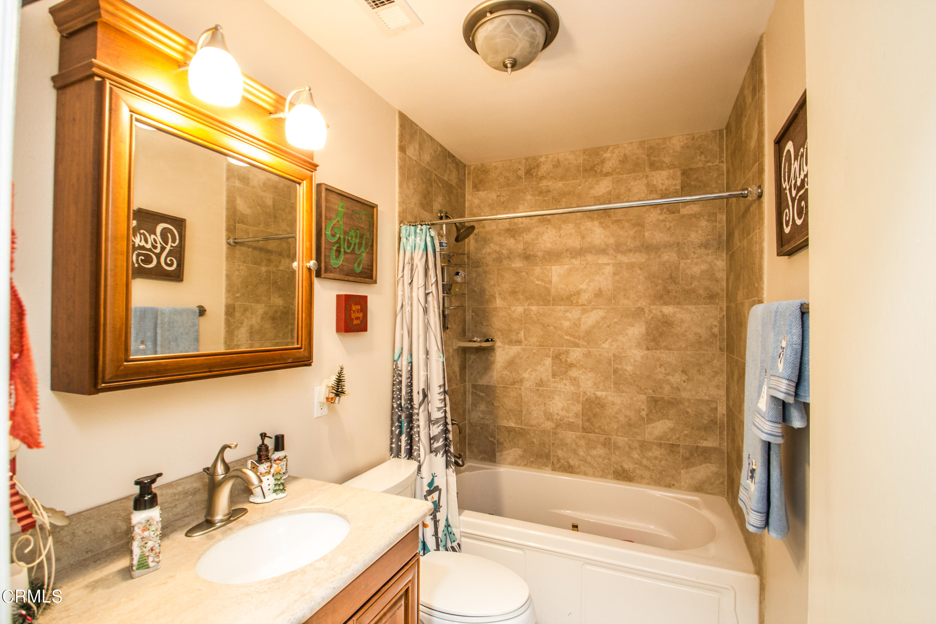 4221 Olds Road Oxnard, CA 93033 - Photo 9 of 34 a bathroom with a shower and a sink