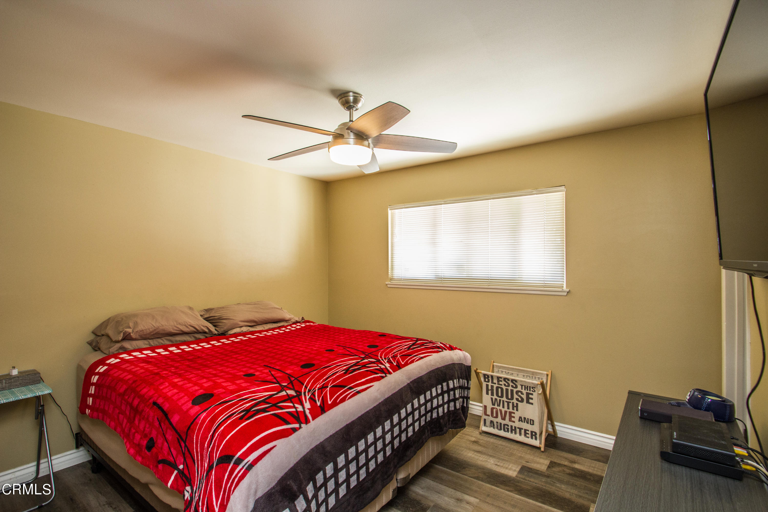 4221 Olds Road Oxnard, CA 93033 - Photo 10 of 34 a bedroom with a bed and a window