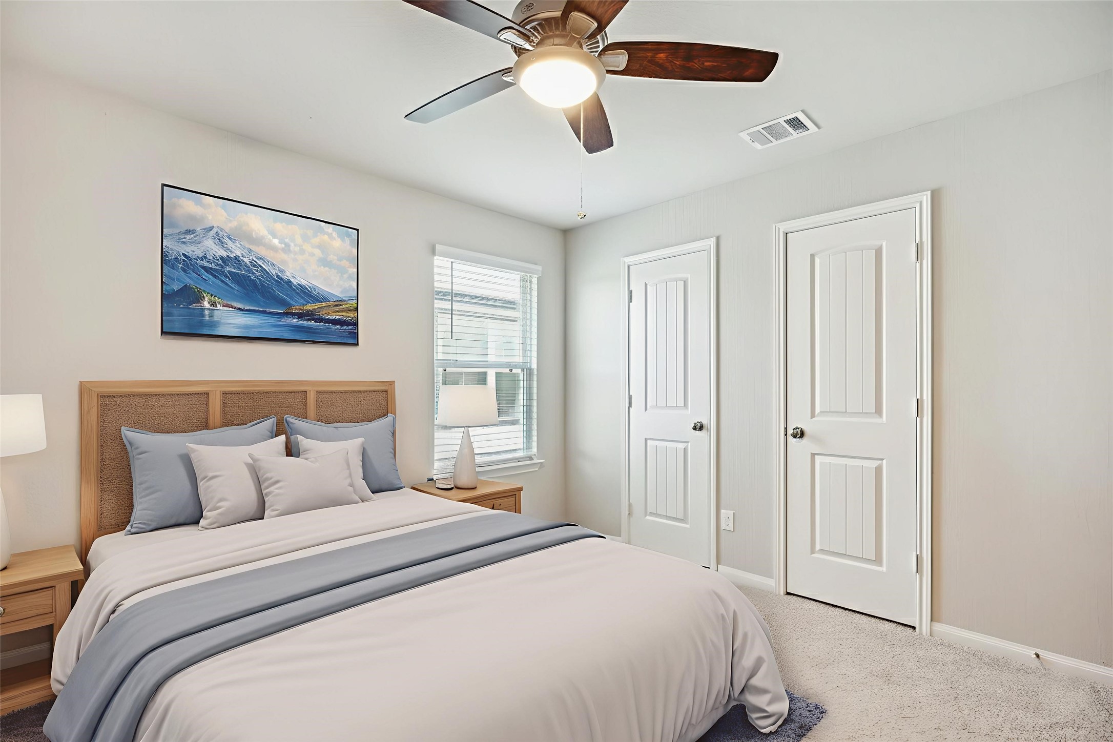 23531 Montague Drive Spring, TX 77373 - Photo 12 of 21 a bedroom with a large bed and a chandelier