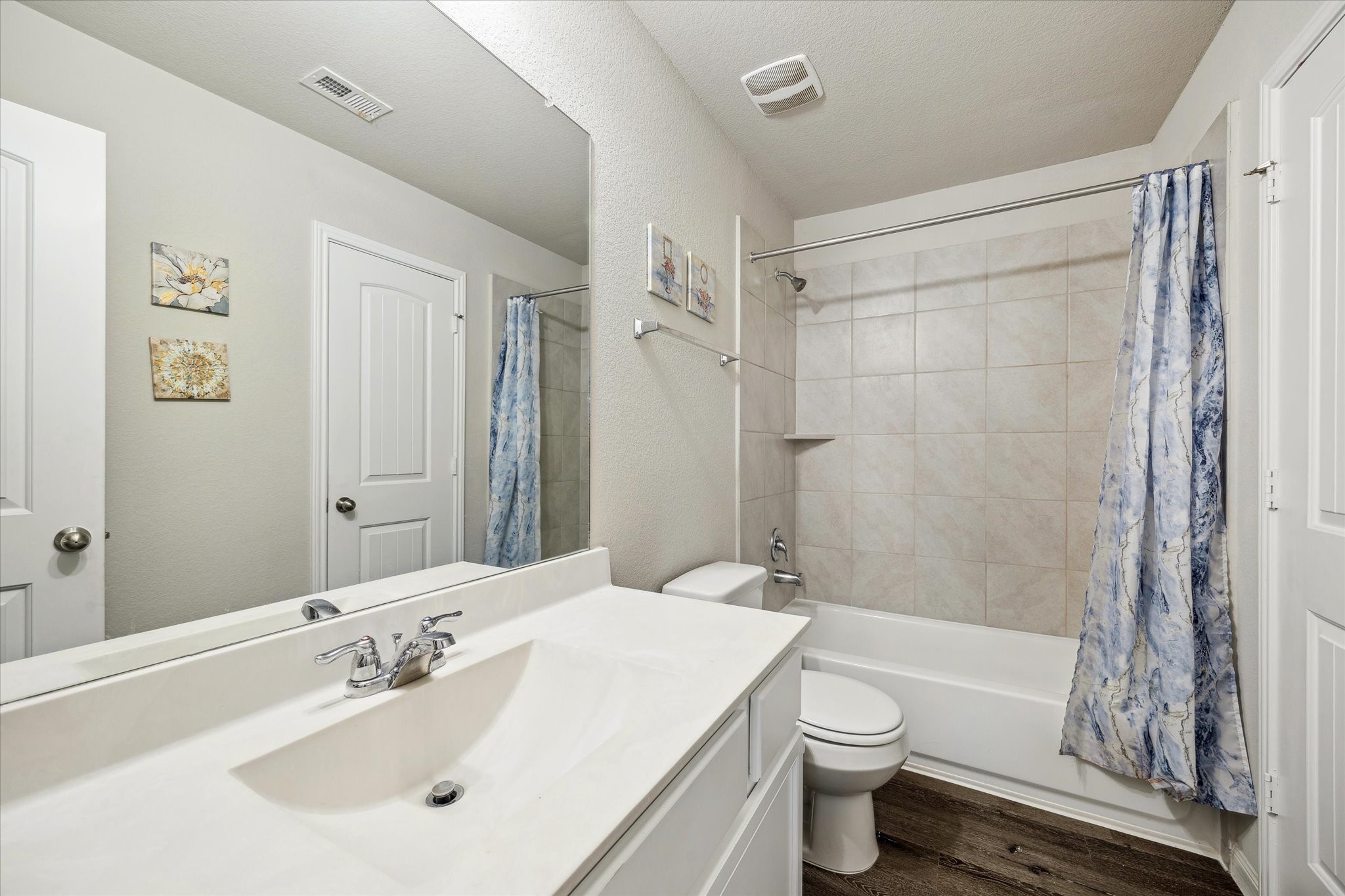 23531 Montague Drive Spring, TX 77373 - Photo 14 of 21 a bathroom with a sink a toilet and shower