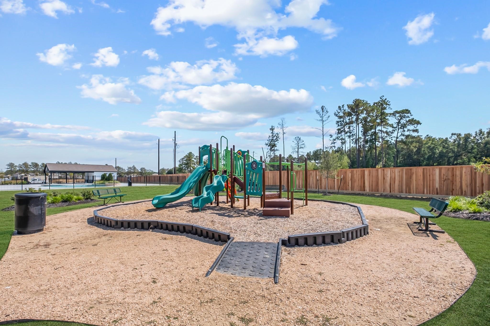 23531 Montague Drive Spring, TX 77373 - Photo 18 of 21 a park view with a slide and swing
