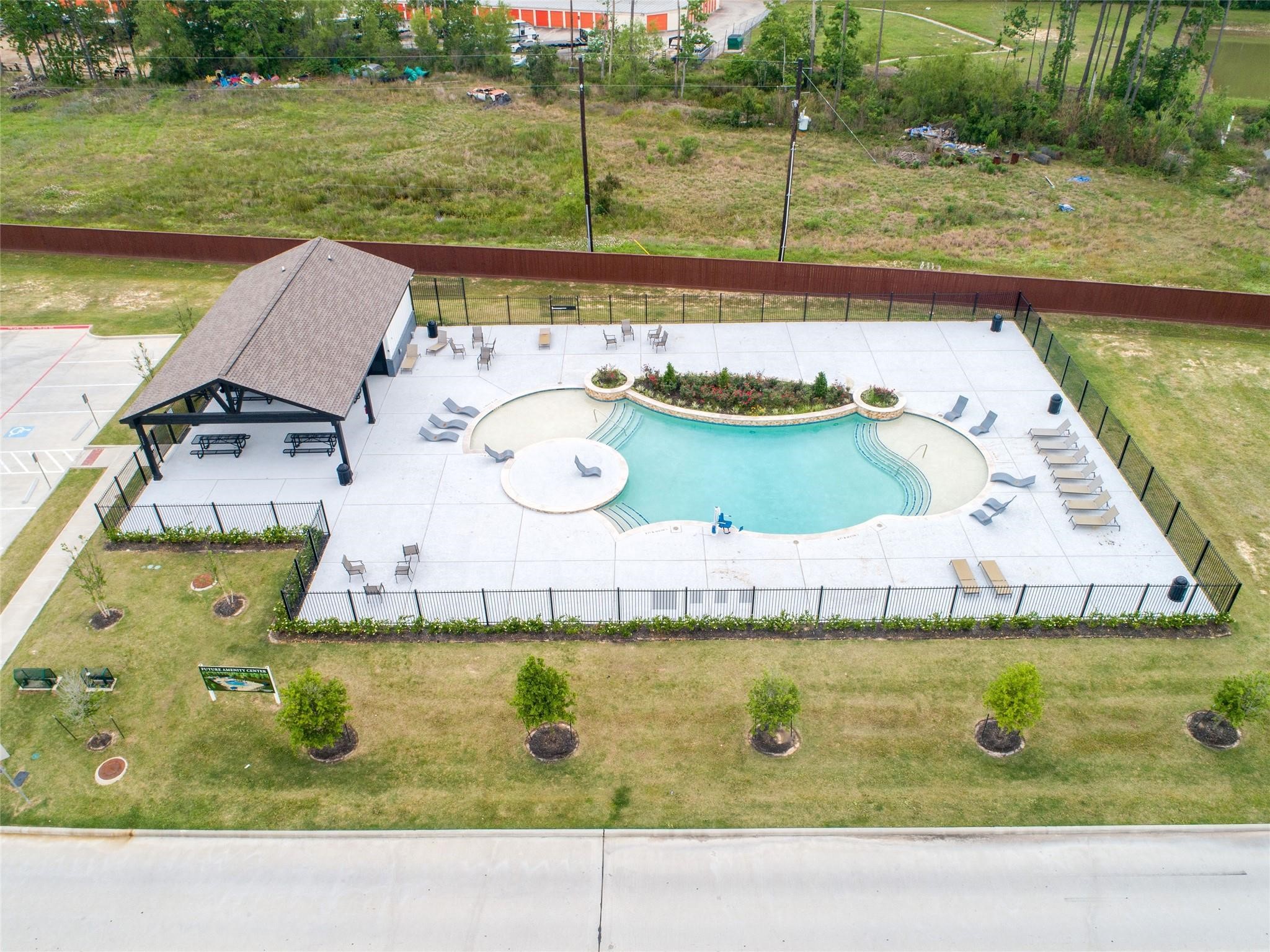 23531 Montague Drive Spring, TX 77373 - Photo 19 of 21 a view of a swimming pool with a yard