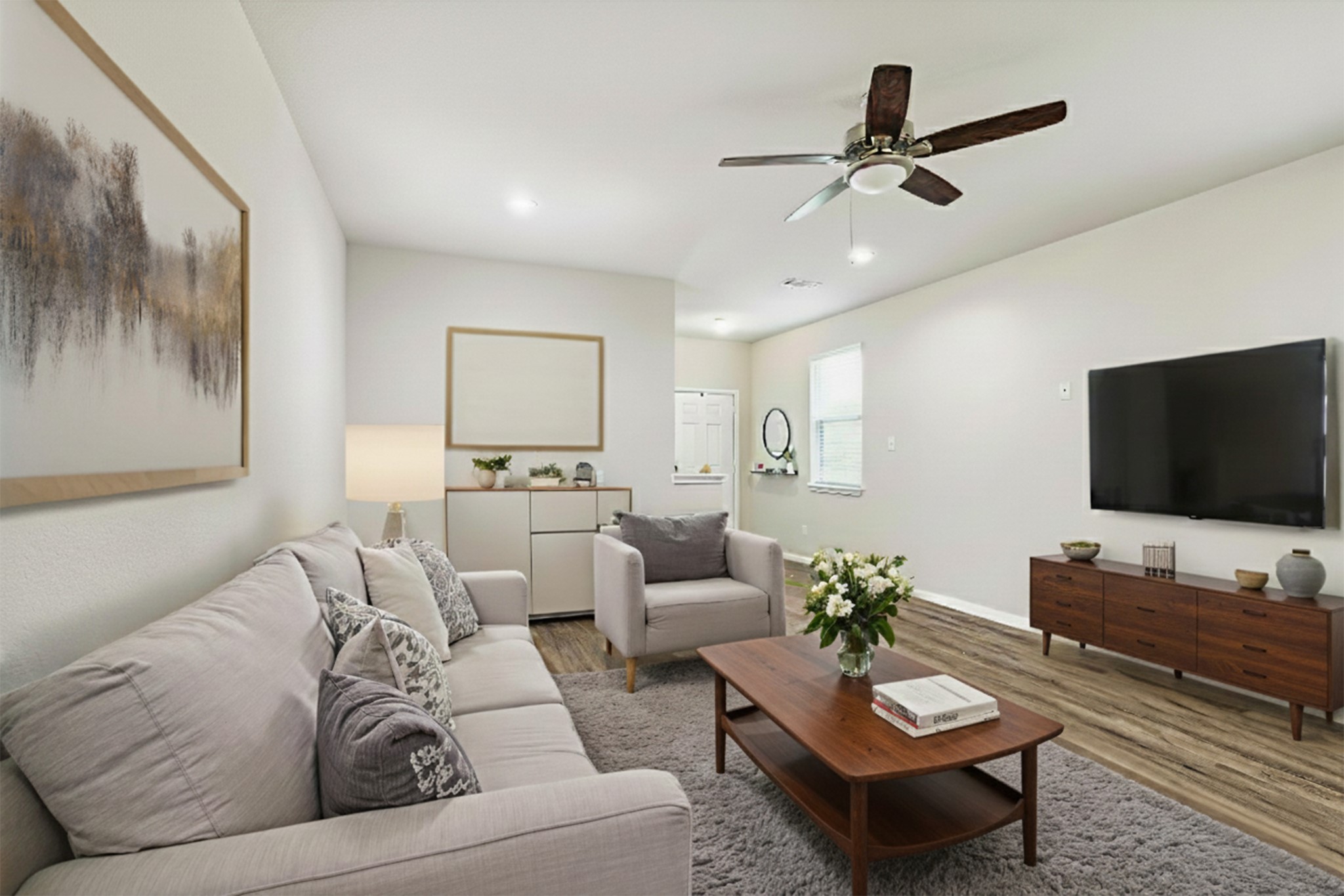 23531 Montague Drive Spring, TX 77373 - Photo 5 of 21 a living room with furniture and a flat screen tv