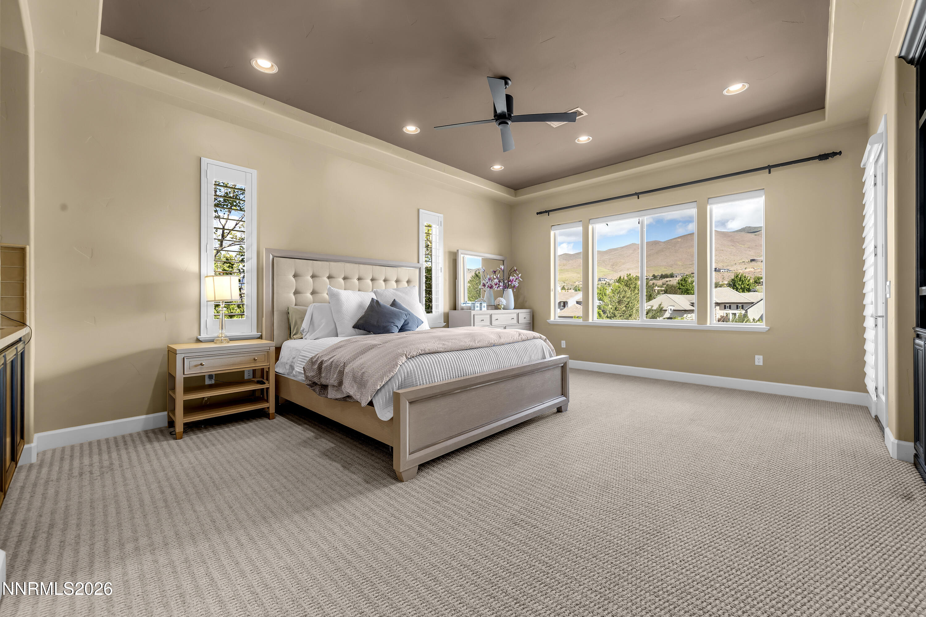 1898 Laurel Ridge Drive Reno, NV 89523 - Photo 8 of 87 a bedroom with a large bed and a large window