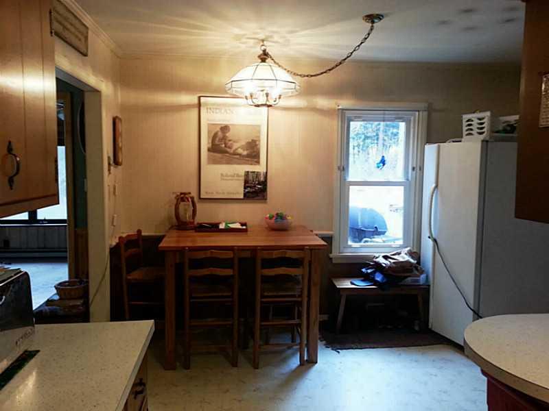 13 Hemlock Road Laughlintown, PA 15655 - Photo 14 of 22 Dining Room. The open plan from the kitchen extends to a dining area.