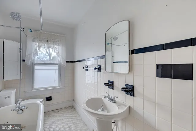 a room with gym equipment and a window