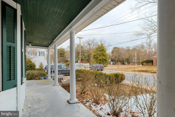 a view of balcony and yard