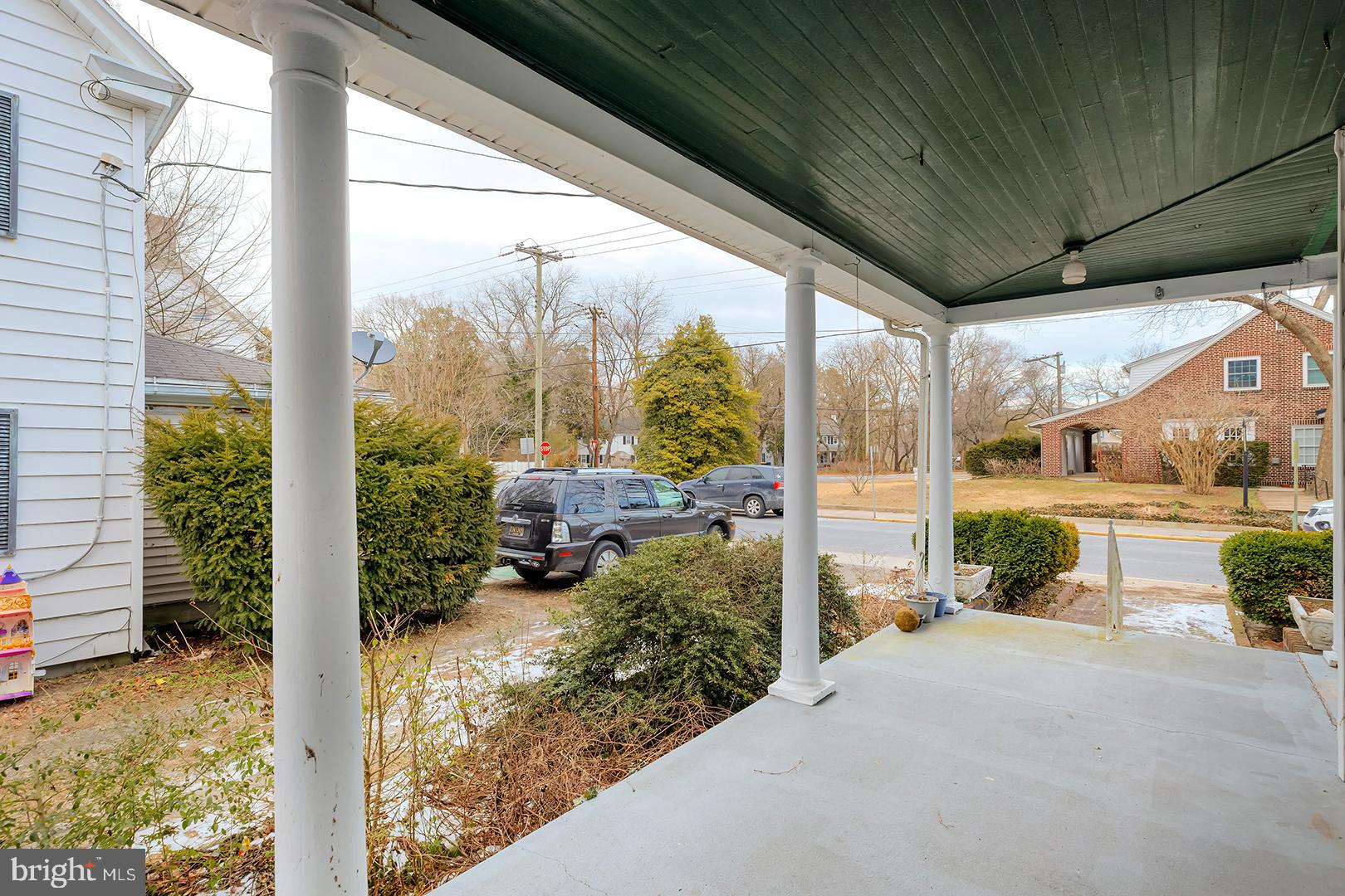 402 Pine Street Laurel, DE 19956 - Photo 6 of 42 a view of a house with porch and furniture