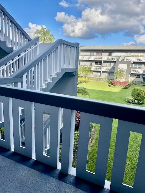 152 Suffolk F Boca Raton, FL 33434 - Photo 18 of 26 a view of a living room and balcony with furniture