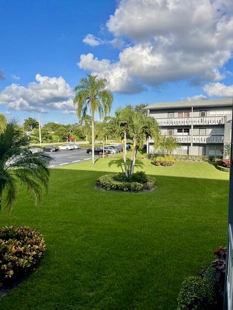 152 Suffolk F Boca Raton, FL 33434 - Photo 20 of 26 a view of a golf course with a garden