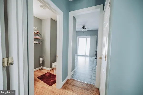 a view of a bedroom from a hallway