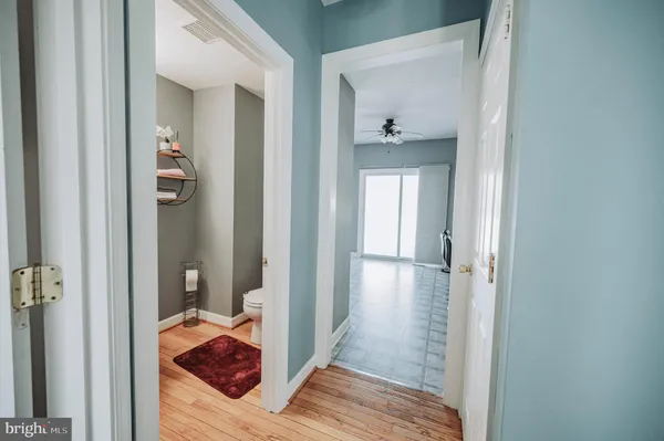 a view of a bedroom from a hallway
