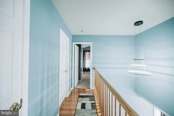 a view of a hallway with closet
