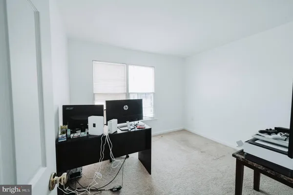 a room with a window and a table