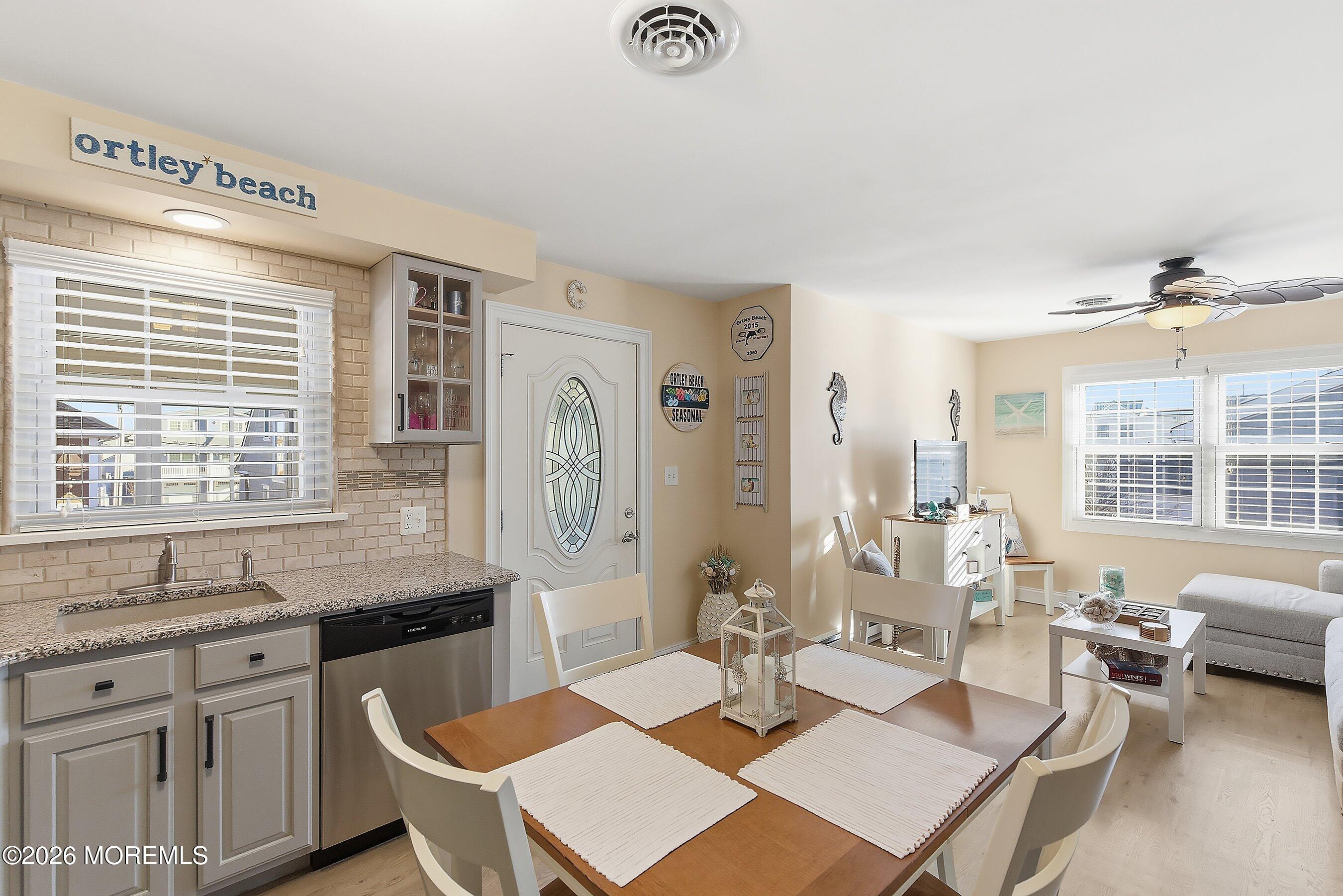 2060 Highway 35, Unit 3 Seaside Heights, NJ 08751 - Photo 11 of 17 a kitchen with granite countertop a sink and a stove