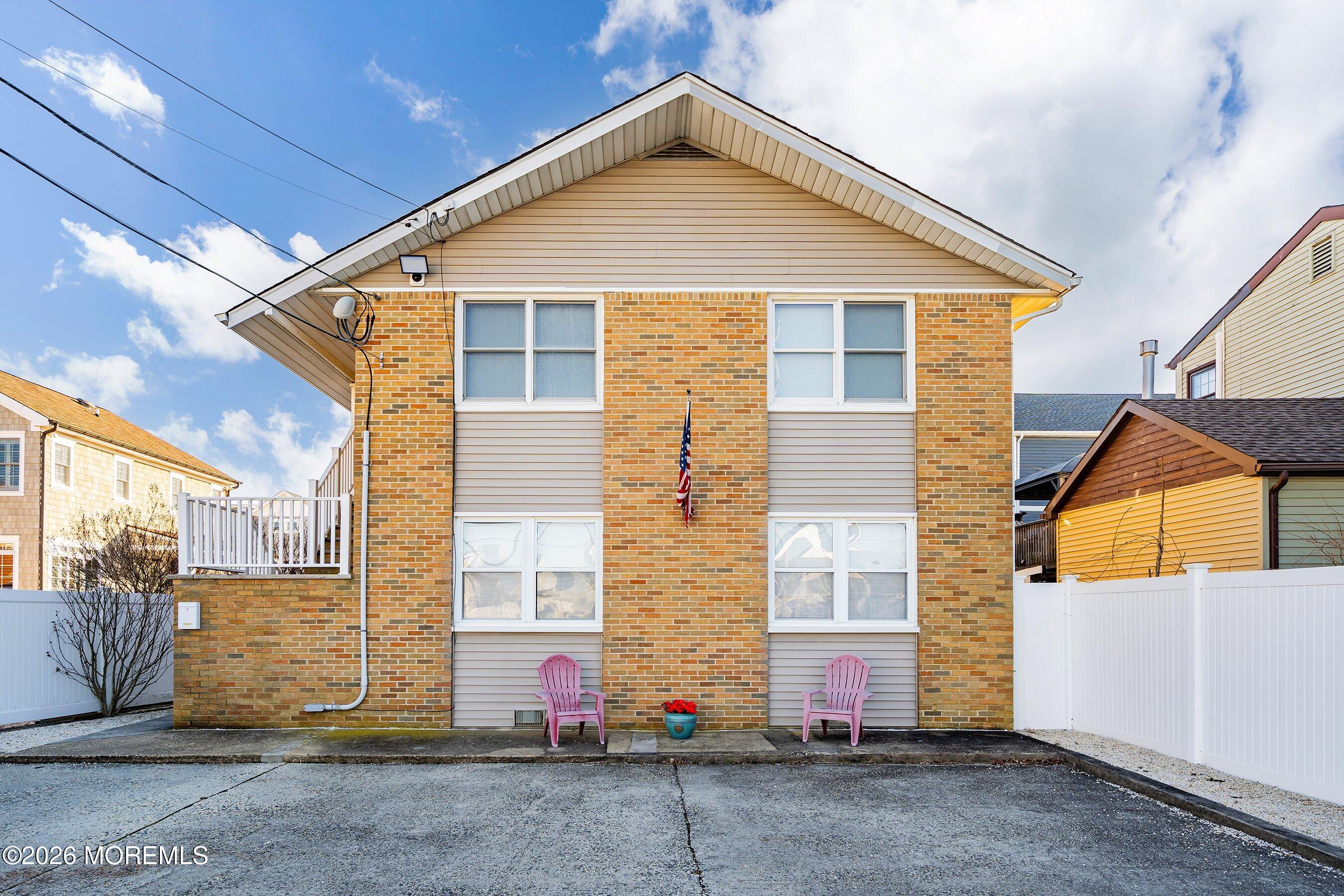 2060 Highway 35, Unit 3 Seaside Heights, NJ 08751 - Photo 2 of 17 a view of a house with large windows