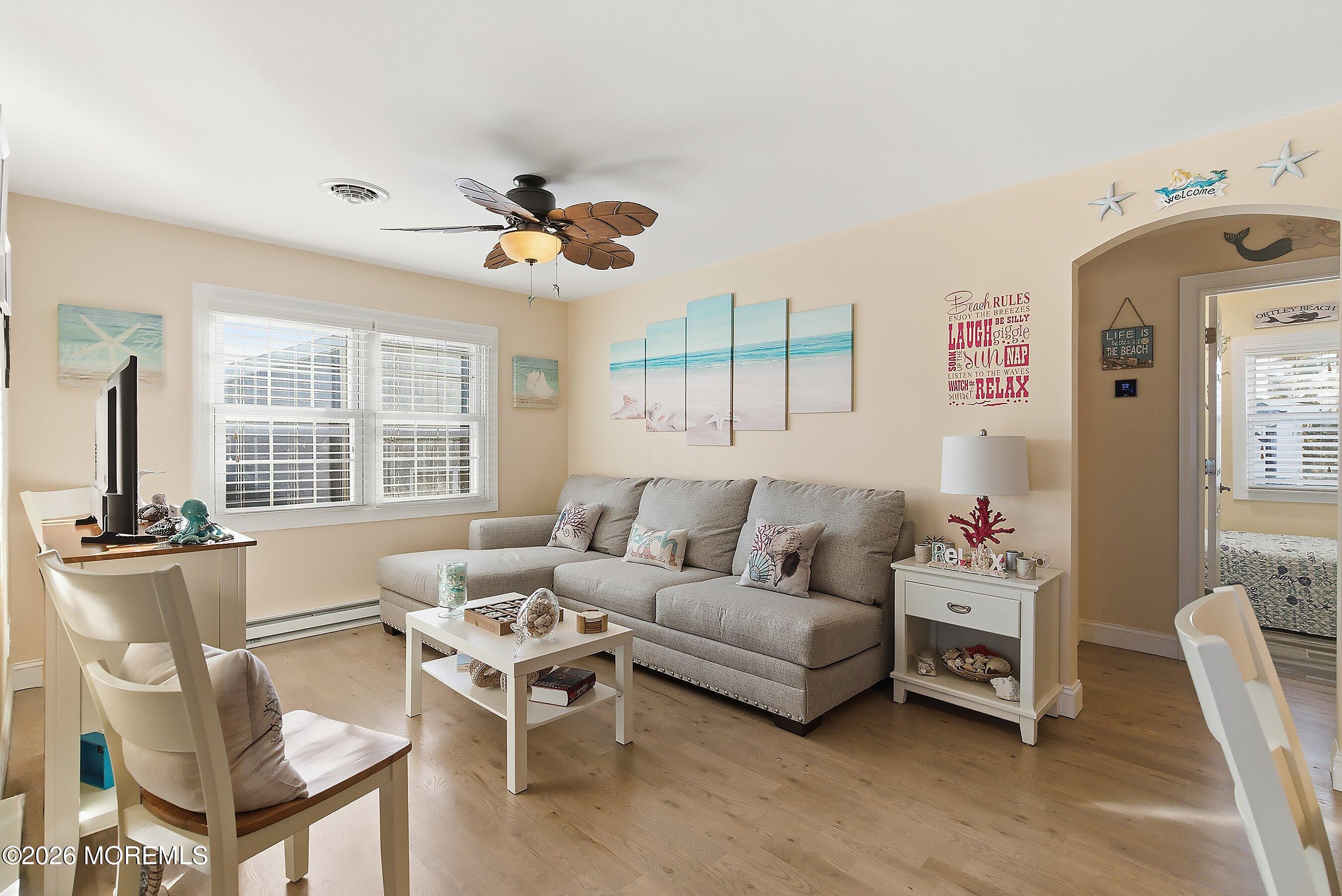 2060 Highway 35, Unit 3 Seaside Heights, NJ 08751 - Photo 4 of 17 a living room with furniture and a large window