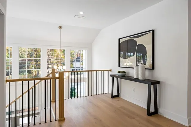 a view of a living room and a balcony