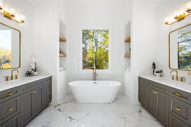 a bathroom with a double vanity sink and a mirror