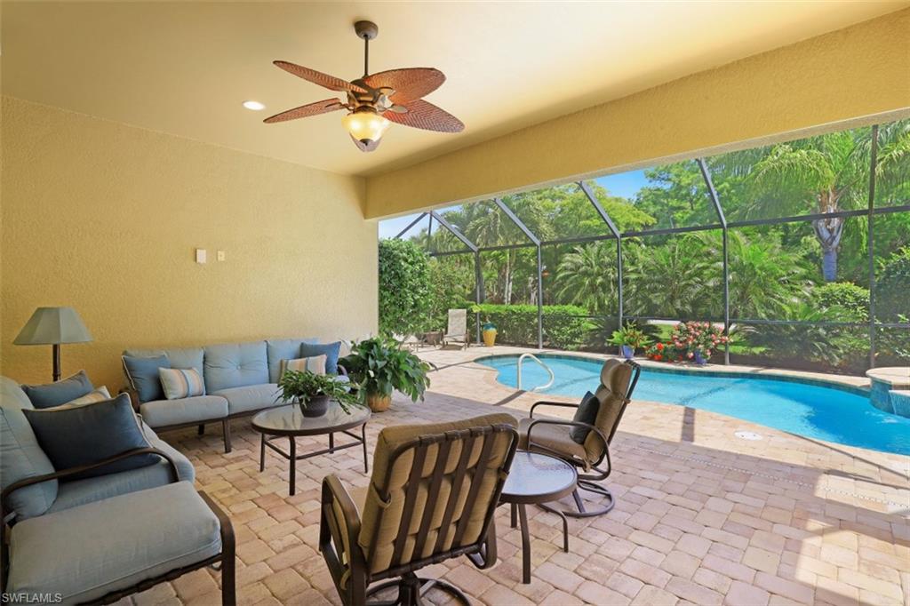 8962 Quarry Drive Naples, FL 34120 - Photo 19 of 35 a dining room with furniture and garden view